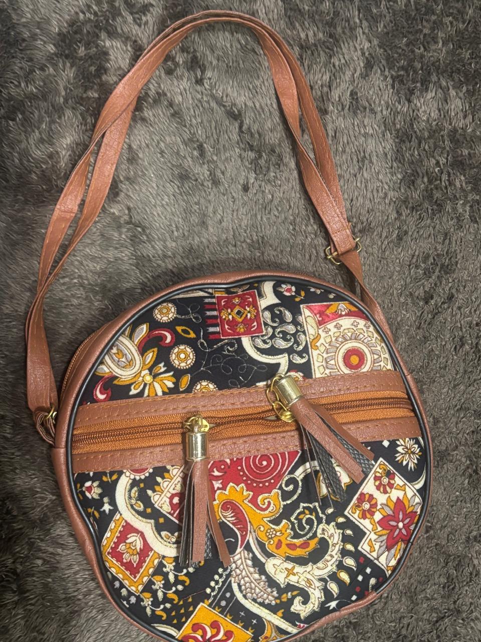 Aajrak Print Round sling bag