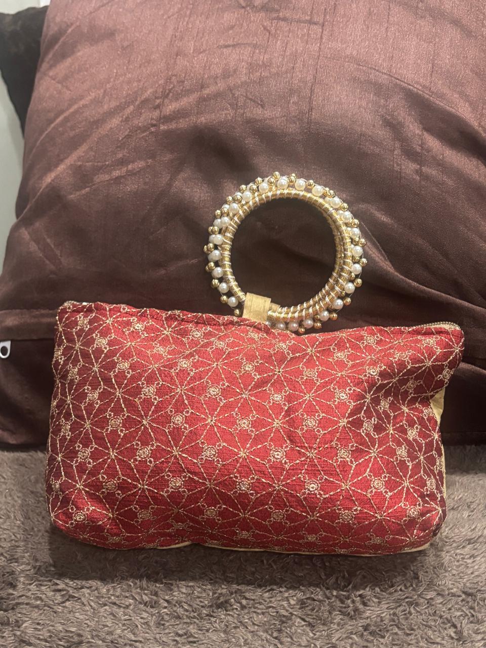 Embroidery maroon purse with bangle handle