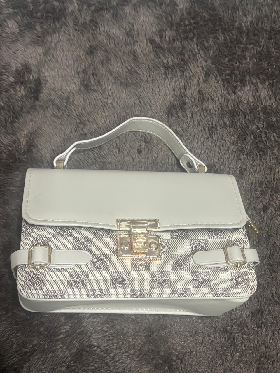 Stylish white leather purse with sling belt